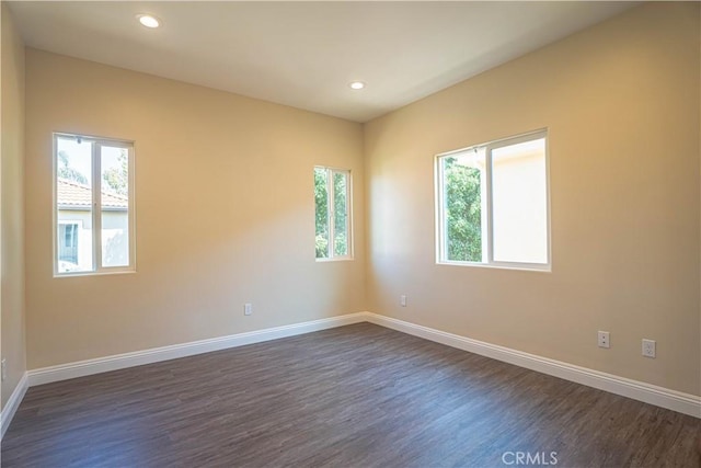 9246 Cedros Ave Unit 1, Panorama City, CA 91402 - unfurnished room with plenty of natural light, dark wood-type flooring, and recessed lighting