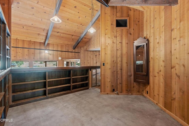 bonus room featuring vaulted ceiling with beams, wood ceiling, wooden walls, and concrete floors