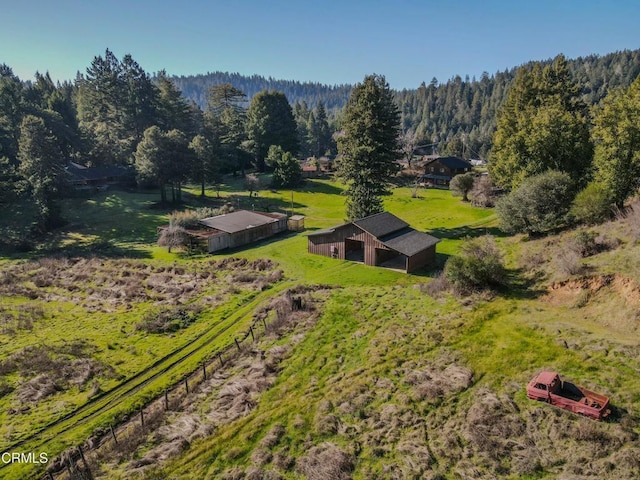 birds eye view of property featuring a rural view