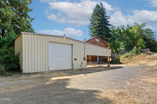 view of outdoor structure featuring a garage