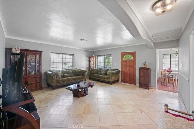 tiled living room with crown molding