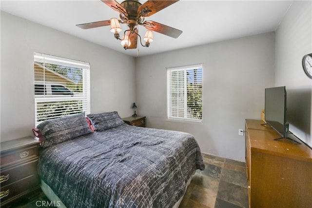 bedroom featuring ceiling fan