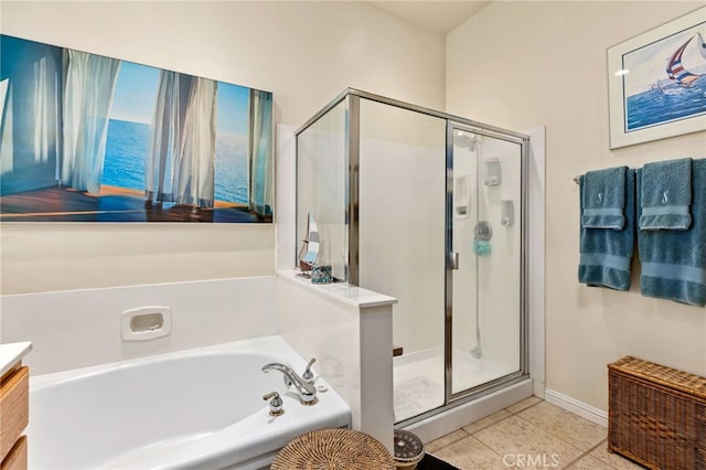 bathroom with separate shower and tub, tile patterned flooring, and vanity