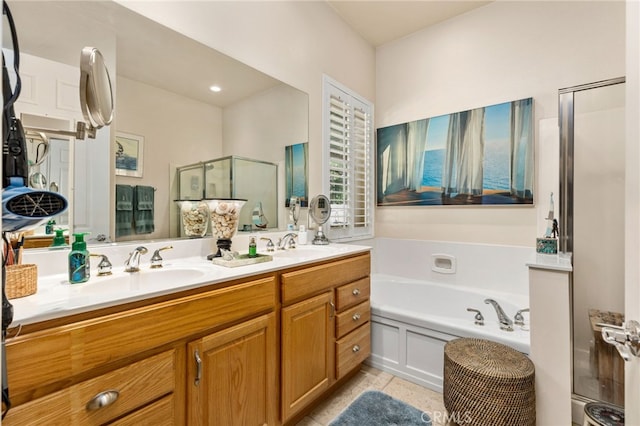 bathroom with vanity, tile patterned floors, and independent shower and bath