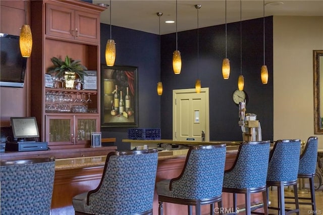 bar with decorative light fixtures