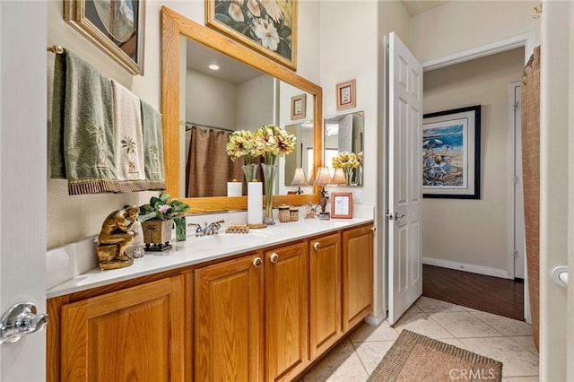 bathroom with vanity and tile patterned floors