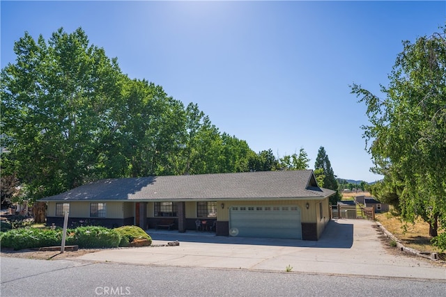 ranch-style home with a garage