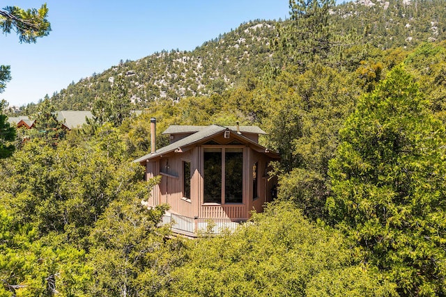 exterior space featuring a mountain view