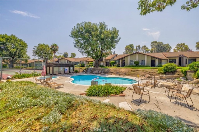 view of pool featuring a patio