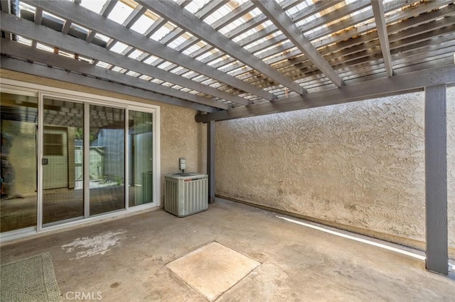 view of patio / terrace featuring a pergola and central AC