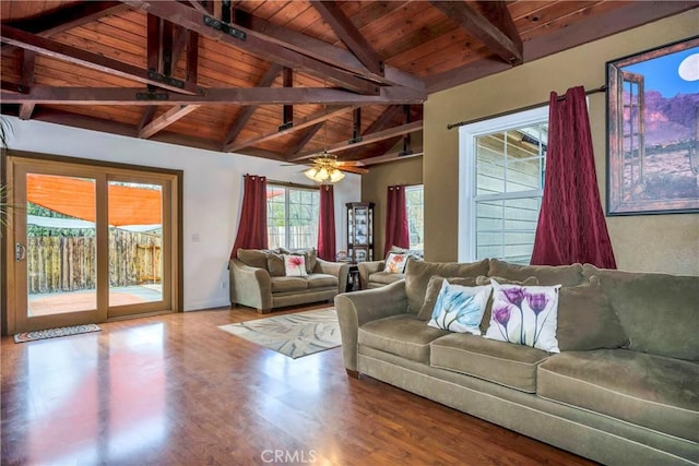 living room with hardwood / wood-style floors, vaulted ceiling with beams, ceiling fan, and wooden ceiling