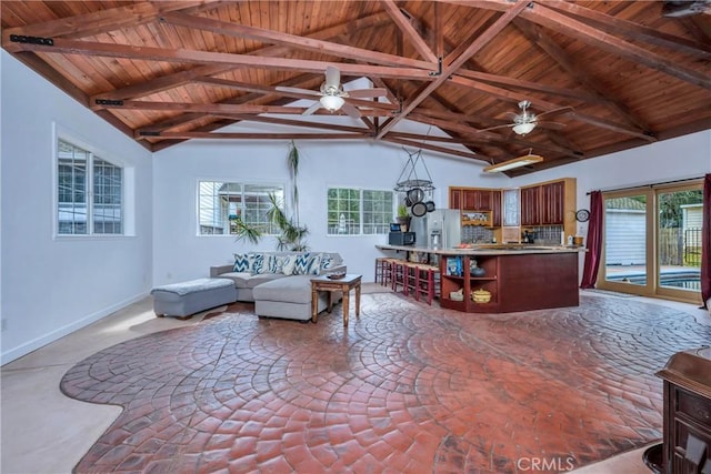 living room with beam ceiling, high vaulted ceiling, and wooden ceiling