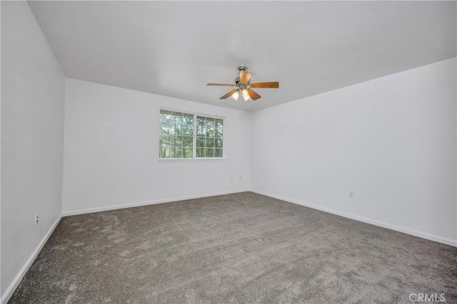 unfurnished room featuring carpet floors and ceiling fan