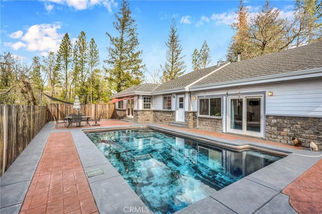 view of pool with a patio area