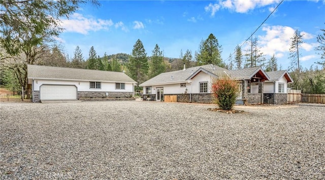 single story home featuring a garage