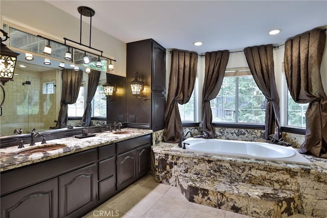 24048 Altdorf Dr, Crestline, CA 92325 - full bath featuring a bath, a stall shower, double vanity, tile patterned floors, and recessed lighting
