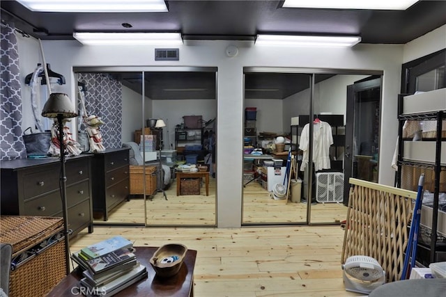 24048 Altdorf Dr, Crestline, CA 92325 - below grade area featuring hardwood / wood-style floors