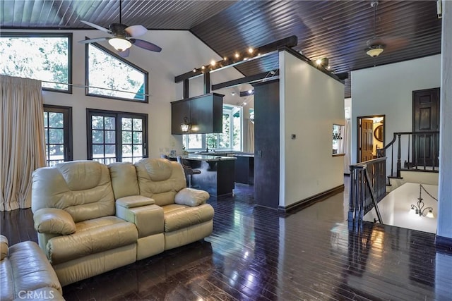 24048 Altdorf Dr, Crestline, CA 92325 - living room featuring ceiling fan, high vaulted ceiling, dark wood-style flooring, and stairway