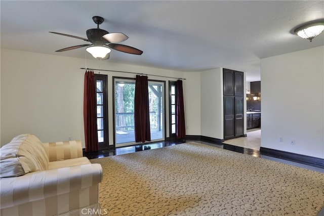 24048 Altdorf Dr, Crestline, CA 92325 - living area featuring a ceiling fan and light wood-style flooring