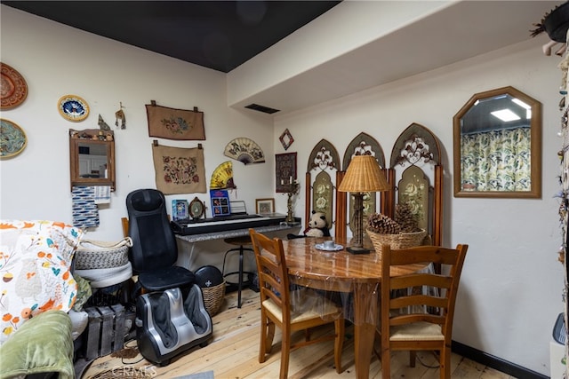 dining room with light wood-type flooring