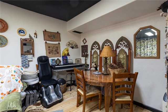 24048 Altdorf Dr, Crestline, CA 92325 - dining space featuring light wood-style flooring