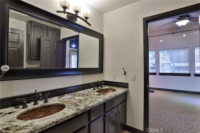 24048 Altdorf Dr, Crestline, CA 92325 - full bath featuring double vanity and baseboards
