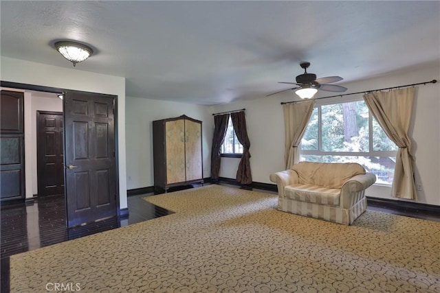 24048 Altdorf Dr, Crestline, CA 92325 - sitting room with a ceiling fan and dark wood-style flooring