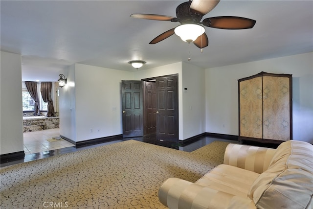 living room featuring ceiling fan