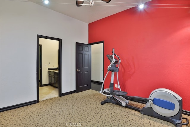 workout room with light colored carpet