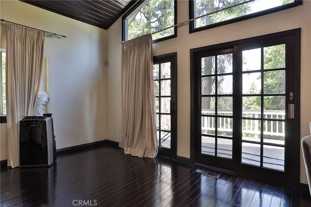 24048 Altdorf Dr, Crestline, CA 92325 - doorway to outside with dark wood finished floors, vaulted ceiling, and wooden ceiling