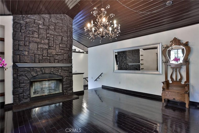 24048 Altdorf Dr, Crestline, CA 92325 - living room with wood ceiling, a chandelier, lofted ceiling, wood finished floors, and a stone fireplace