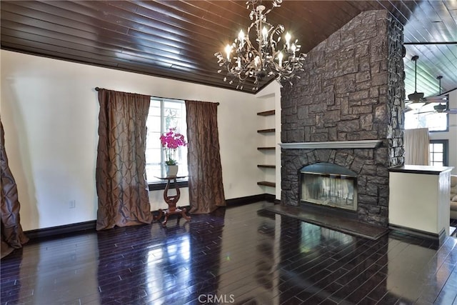 24048 Altdorf Dr, Crestline, CA 92325 - unfurnished living room featuring lofted ceiling, a chandelier, built in shelves, wood-type flooring, and wooden ceiling