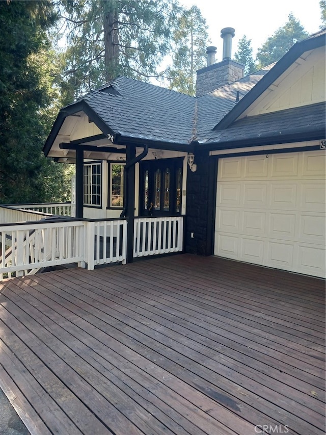 deck featuring a garage