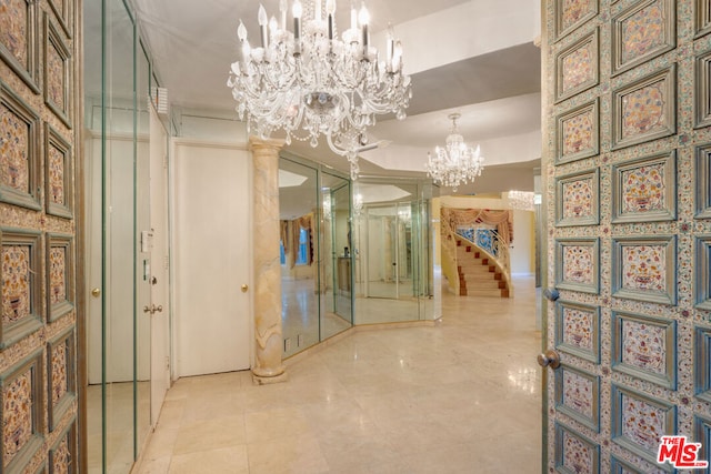 interior space featuring an inviting chandelier