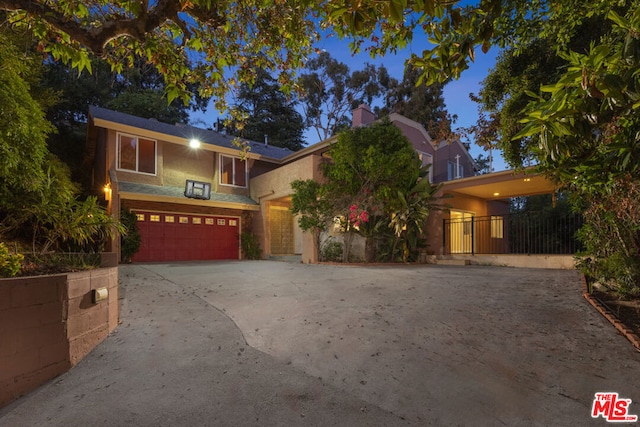 view of front of home with a garage