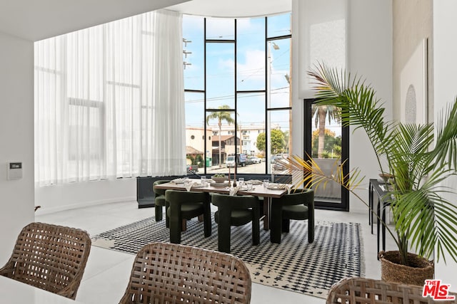 dining area with tile patterned floors