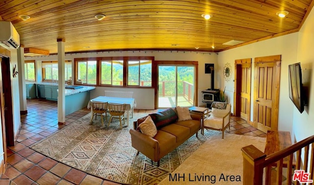 living room featuring a wall unit AC, wooden ceiling, vaulted ceiling, a wood stove, and tile patterned flooring