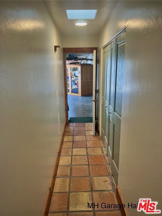 hallway with a skylight