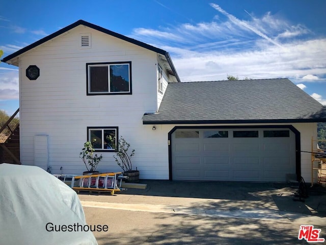 view of front of home featuring a garage