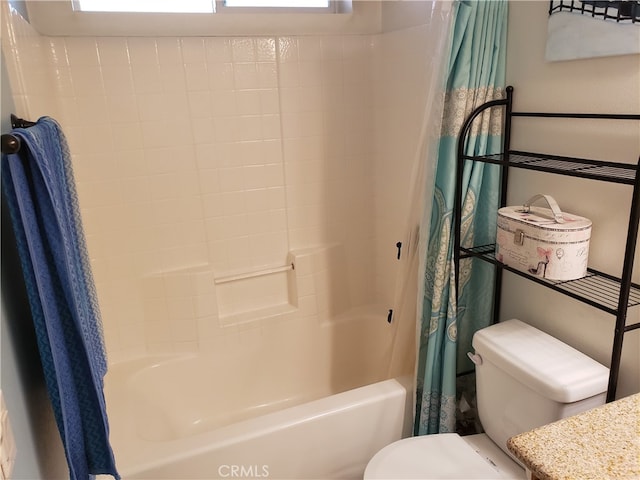 full bathroom with shower / bath combo, vanity, and toilet