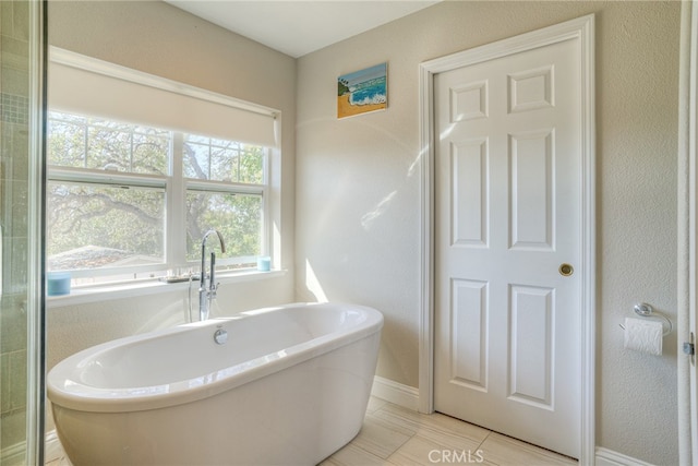 bathroom with a bathing tub