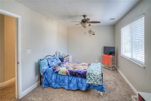 bedroom with carpet and ceiling fan