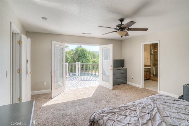 bedroom with access to outside, a textured ceiling, light carpet, and ceiling fan