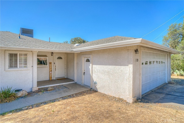 property entrance featuring a garage