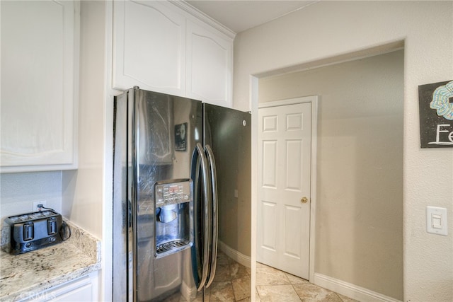 bathroom featuring vanity, toilet, and tile patterned floors