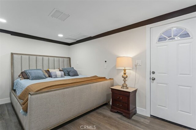 bedroom featuring hardwood / wood-style floors