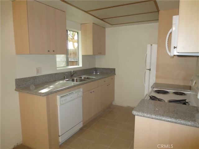 kitchen with white appliances and sink