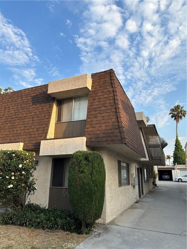 view of building exterior featuring a garage