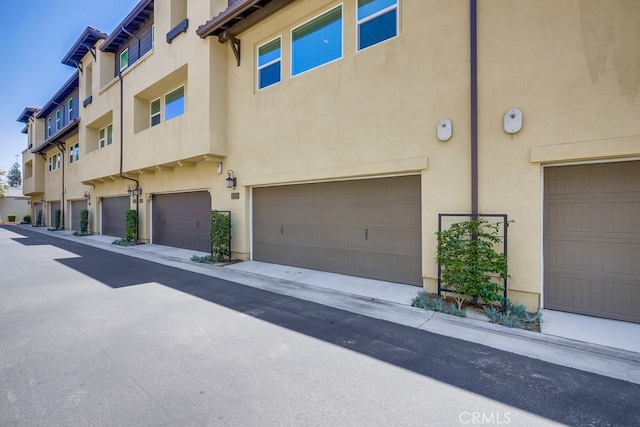 exterior space with a garage