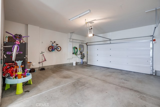 garage featuring water heater